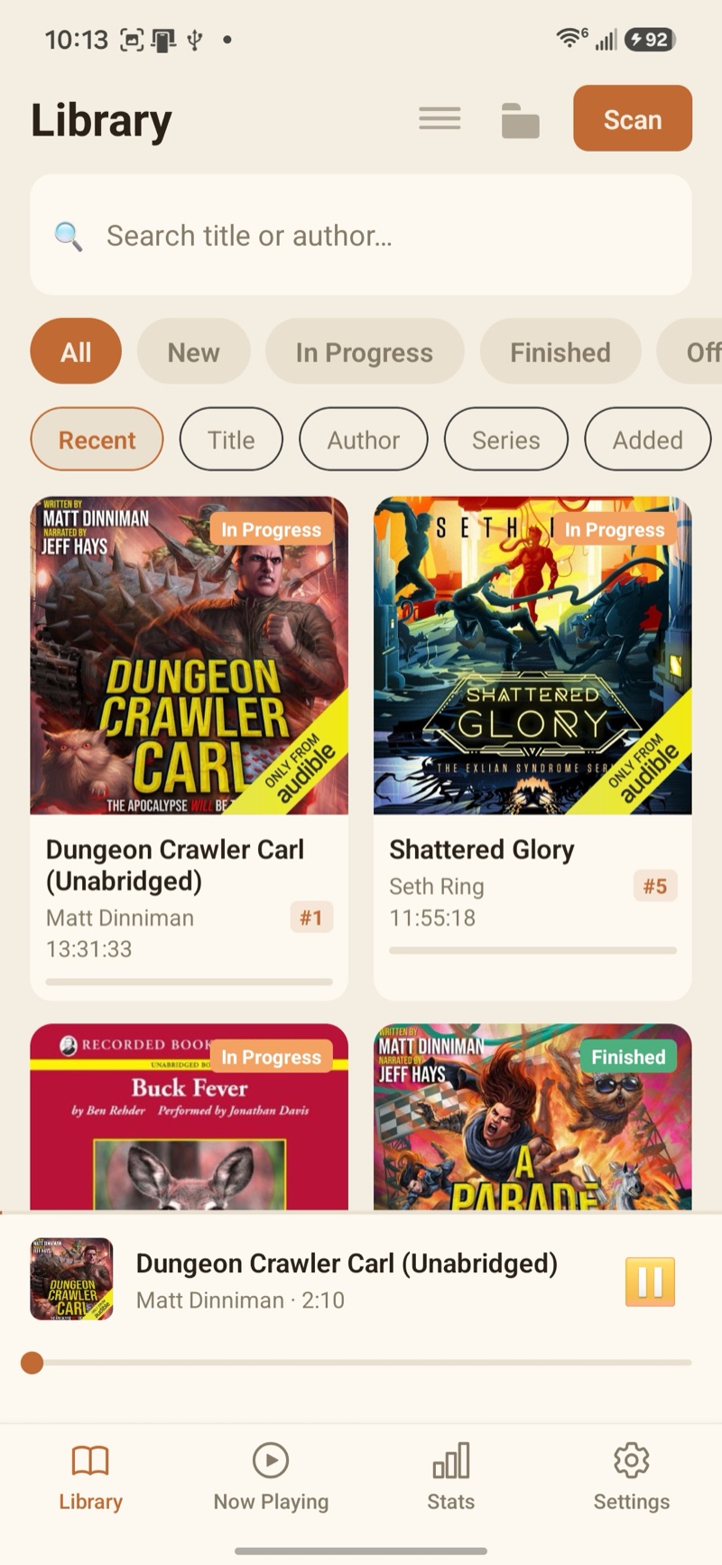 Crane Audiobook Player library grid showing book covers and status filters